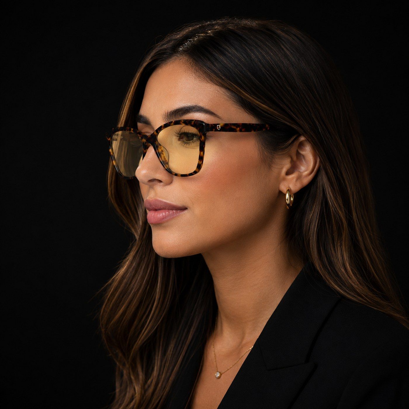 Eyegis Clarity women's blue-light glasses — champagne acetate frame photographed in Paris at golden hour, showing lightweight design and true-tone lenses.